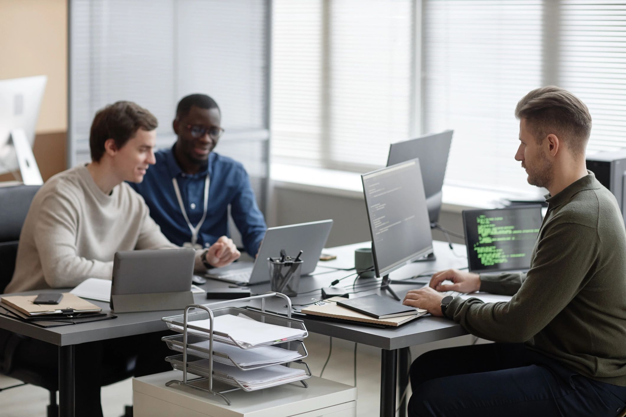 Tech team collaborating in a modern office